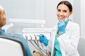 dentist smiling with patient
