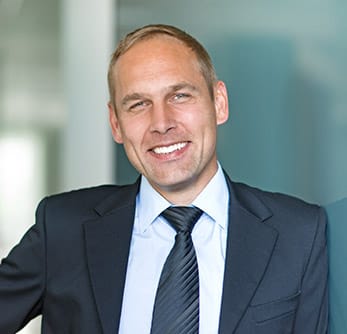 man in suit smiling