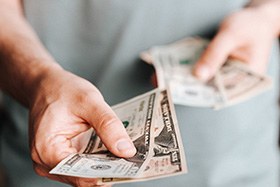 Man paying with cash