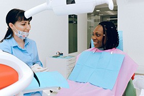 Woman speaking with dentist