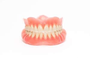 brand new dentures glistening pink resin