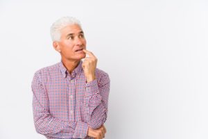 mature man looking puzzled